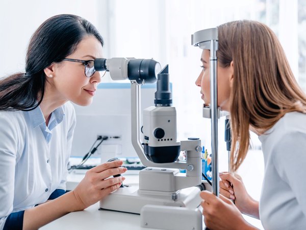 Woman receiving an eye exam